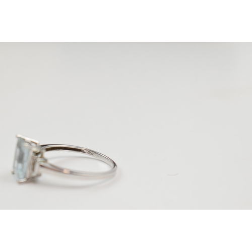 250 - 18ct white gold ring set with aqua marine stone, 2.1 grams, size N.