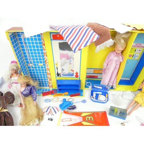 277 - A good collection of vintage Sindy and Barbie dolls and accessories. Including Hotel Continental fol... 