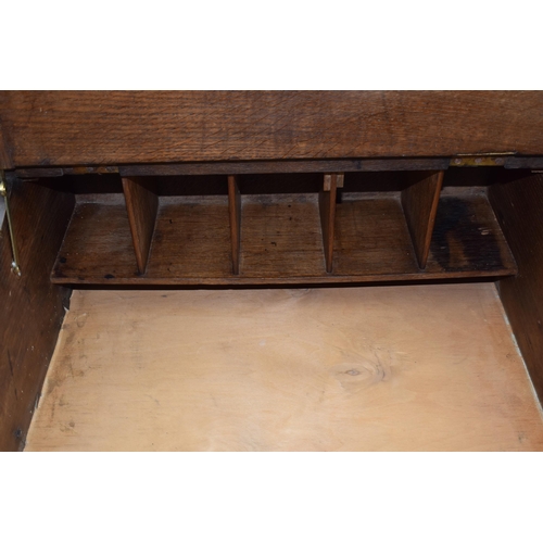 435 - 20th century oak writing slope / table top bureau with working lock, 61x57x25cm tall.