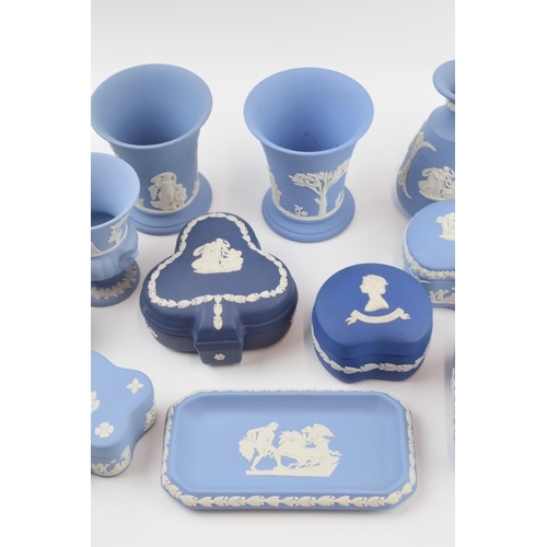 147 - Wedgwood Jasperware in varying shades of blue to include trinkets, vases and others (14).