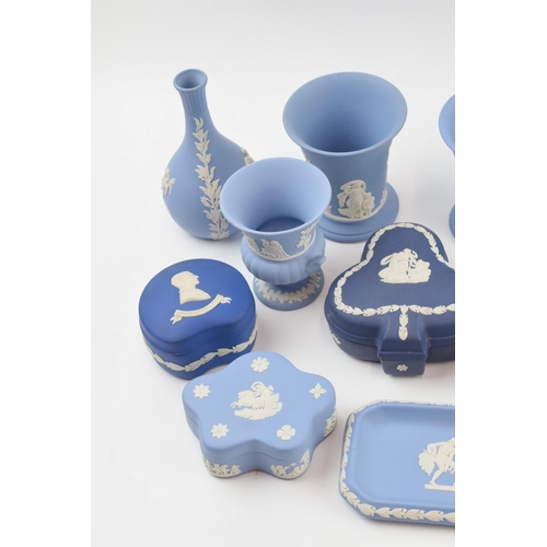 147 - Wedgwood Jasperware in varying shades of blue to include trinkets, vases and others (14).