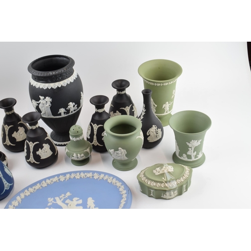 150 - Wedgwood Jasperware to include colours such as black, green and others to consist of a large vase, s... 