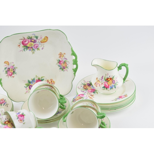 162 - George Jones & Sons Crescent China tea set in a floral green design to include a cake plate, a milk ... 