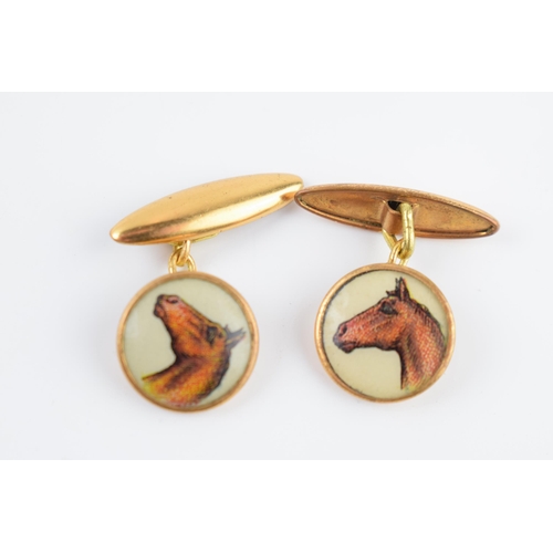 208 - A pair of vintage gilt metal cufflinks with horse's heads transfer decoration (2).