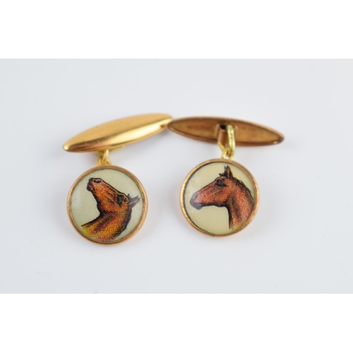 208 - A pair of vintage gilt metal cufflinks with horse's heads transfer decoration (2).