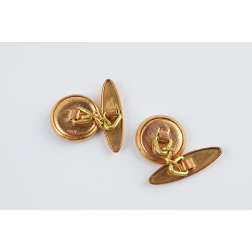 208 - A pair of vintage gilt metal cufflinks with horse's heads transfer decoration (2).