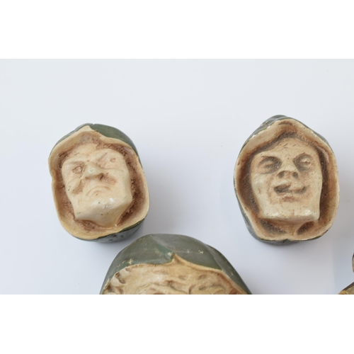 311 - Unusual vintage cast plaster wall hanging busts in the form of beggars and evil looking character, o... 