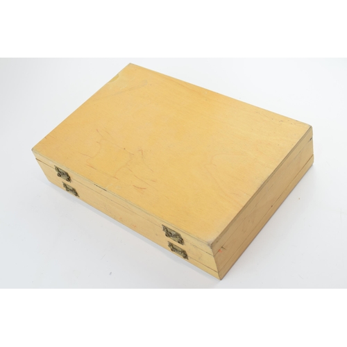 315 - A wooden case to include a large quantity of fly fishing lures, box 30x20cm.