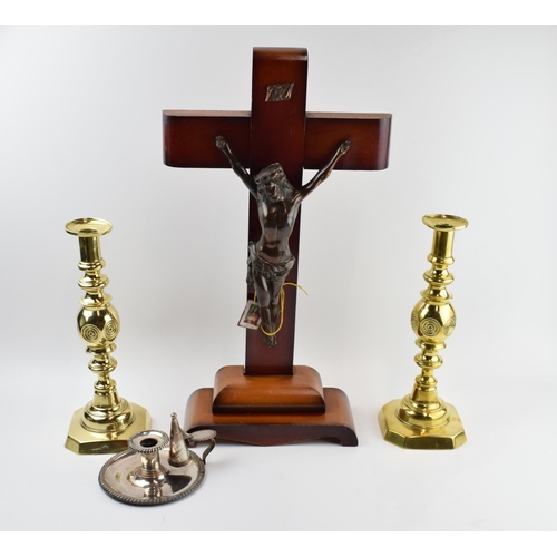 319 - A large wooden and metal religious church crucifix together with an ecclesiastical style pair of bra... 