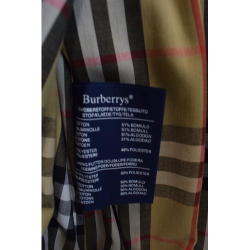 333 - Classic vintage Burberrys' rain coat. Cream with classic cheque interior. Made in England. Approxima... 