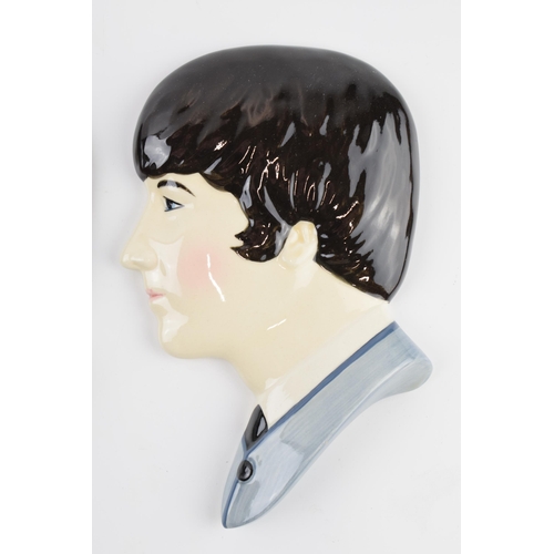 6 - Moorland Pottery Beatles face wall plaques: Lennon and McCartney (2), 15cm tall.