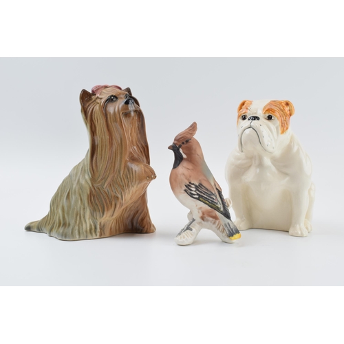 64 - Beswick Bulldog together with a Yorkshire Terrier with raised paw (second) together with a Goebel wa... 