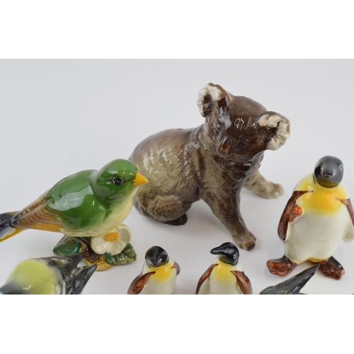 70 - Beswick animals to include a penguin with 2 penguin chicks, a koala and three birds (7).