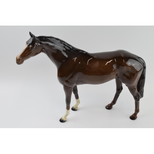 76 - Beswick to include large brown racehorse, Dales pony Maisie, Mare Facing Left and grey Shetland (4) ... 