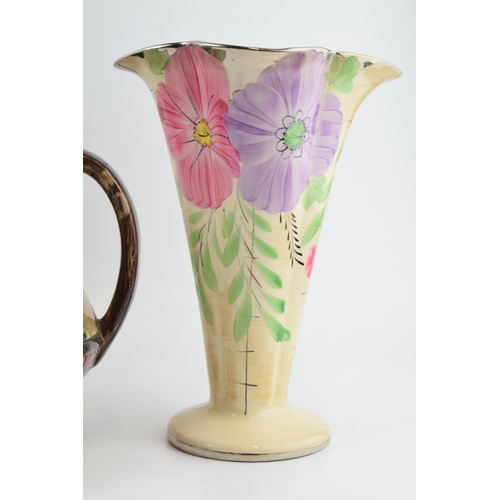 90 - A pair of Arthur Woods floral shaped trumpet vases and a large two handled floral vase, believed to ... 