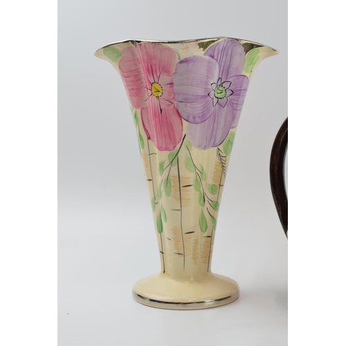 90 - A pair of Arthur Woods floral shaped trumpet vases and a large two handled floral vase, believed to ... 