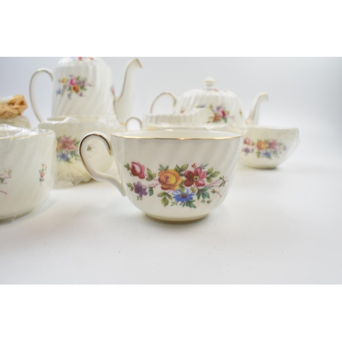 169 - Minton Marlow tea service to include six trios, milk, cream, coffee pot and tea pot.