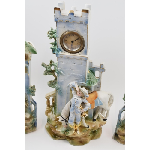 180 - Edwardian continental pottery mantle clock with matching garniture vases (3), 41cm tall.