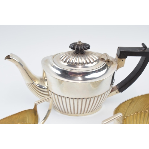 245 - Hallmarked silver 3 piece tea set to include teapot with ebonised handle, milk and sugar bowl, total... 