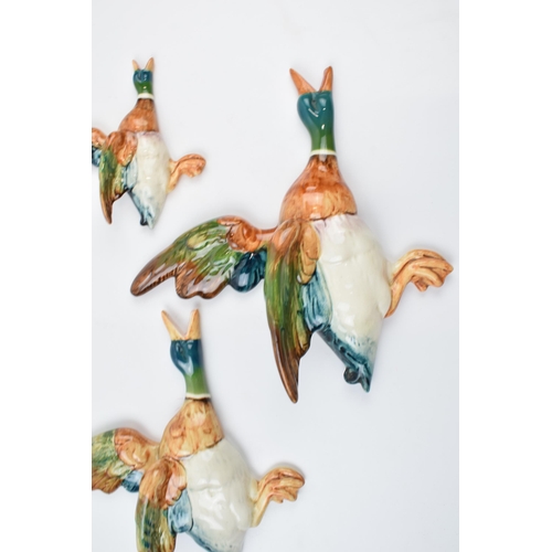 61H - Beswick flying mallard wall plaques to include 596- 1, 596-2 and 596-4 (3).