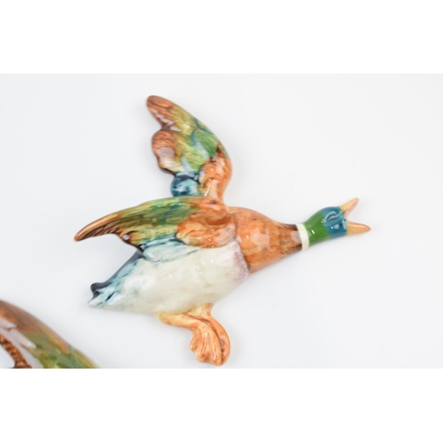 61H - Beswick flying mallard wall plaques to include 596- 1, 596-2 and 596-4 (3).