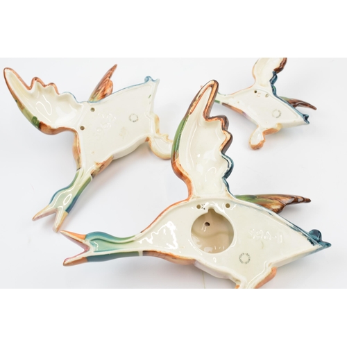 61H - Beswick flying mallard wall plaques to include 596- 1, 596-2 and 596-4 (3).