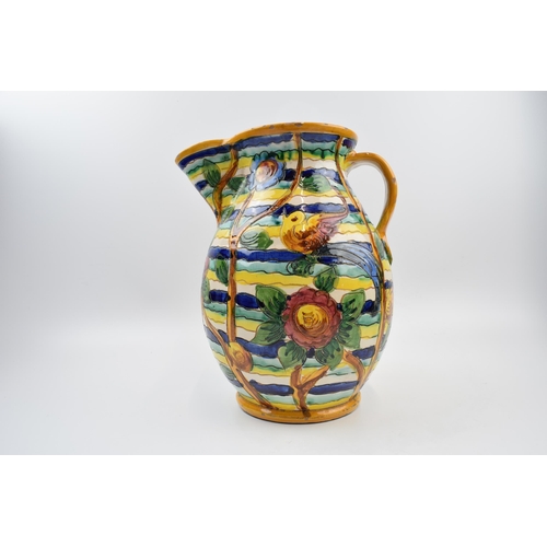 84 - Late 19th / Early 20th Century decorative jug in an abstract style with ribbed decoration of birds a... 