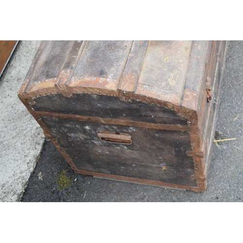 438 - Vintage travelling trunk with domed top, metal bound, 92x52x64cm tall.