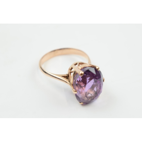 220A - 9ct gold ring set with large amethyst stone, 7.1 grams, V/W.