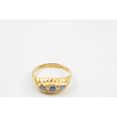 220C - 18ct gold ring set with diamonds and sapphires, 2.4 grams, size K.