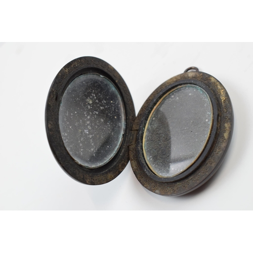 220O - Large Victorian vulcanite Mizpah locket, 6cm tall.