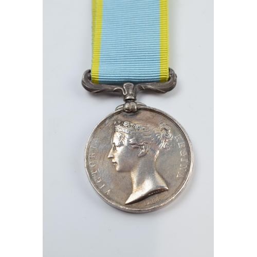 269A - Queen Victoria silver Crimea medal on ribbon, unmarked.