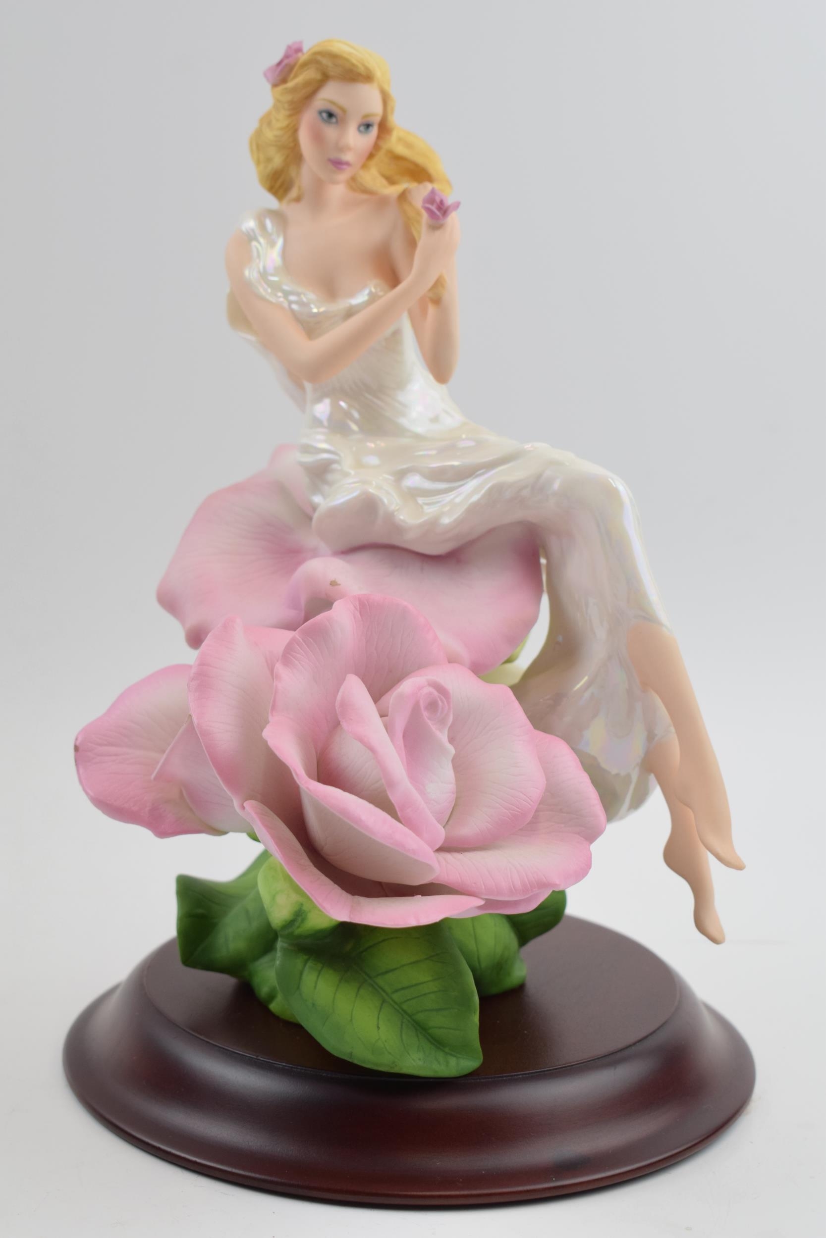 Franklin Mint figure Lady Rose on wooden base.