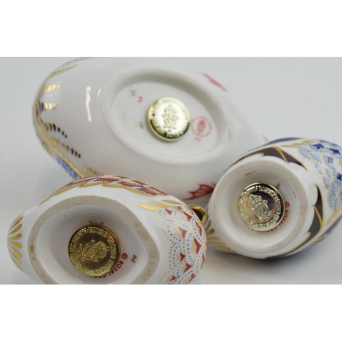 48 - Royal Crown Derby Paperweights in the form of a Duck, a Swimming Duckling and a Sitting Duckling, fi... 