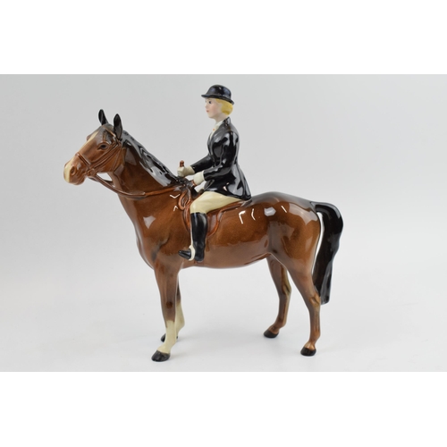 59 - Beswick Huntswoman on Brown Horse 1730.