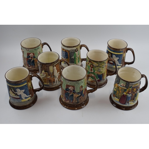 72 - A collection of Beswick embossed tankards of varying scenes (8).