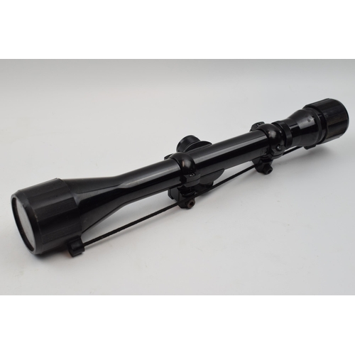 383 - BSA 4 x 40 scope and mounts, complete with lens covers and a cased pair of 10 x 25 compact Virgin Ba... 