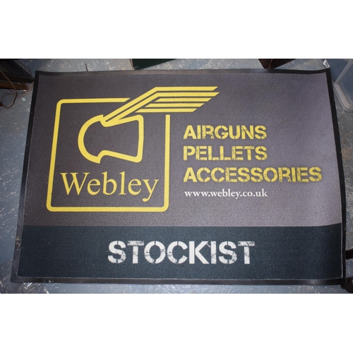 384 - Rare Webley 'Stockist' shop floor advertising mat with large flying pellet logo complete with Webley... 