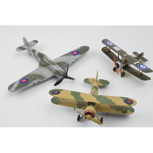 399 - Three model die cast model war planes. Dinky Hawker Hurricane, Corgi Gladiator, Egypt 1940 and a Sop... 