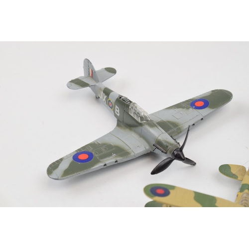 399 - Three model die cast model war planes. Dinky Hawker Hurricane, Corgi Gladiator, Egypt 1940 and a Sop... 