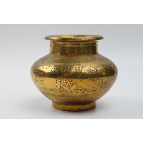 416 - Indian brass bulbous vase with engraved traditional decoration, heavy, 11cm diameter.