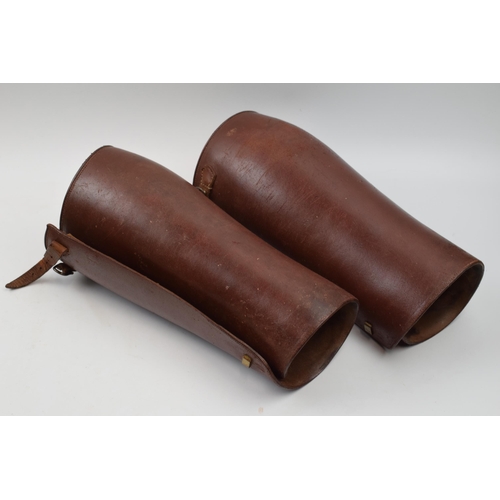 417 - A pair of vintage leather gators, 29cm long.