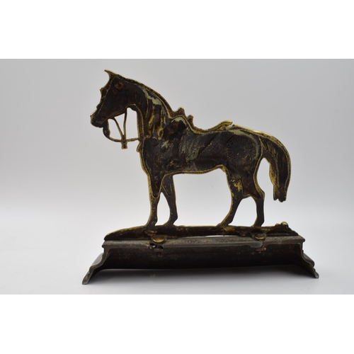 419 - Antique cast brass and metal doorstop in the form of a horse wearing tack, 24.5cm wide.