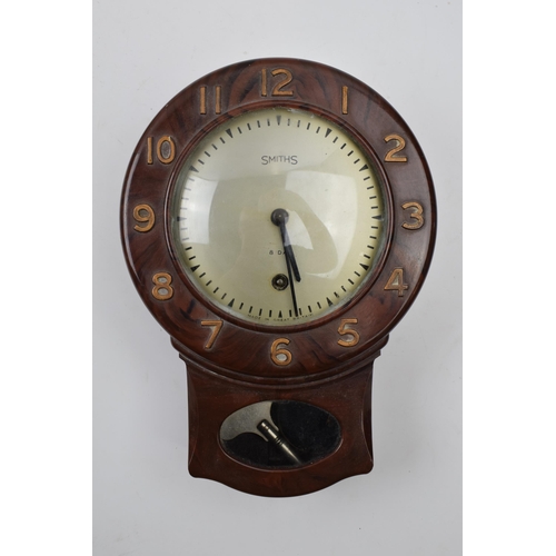 421 - Smiths vintage 8 day Bakelite wall clock, 28cm long.