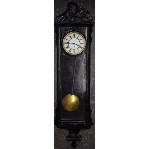 422 - Late 19th / early 20th century Vienna wall clock with wooden frame painted black with pendulum and w... 