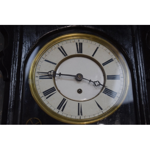 422 - Late 19th / early 20th century Vienna wall clock with wooden frame painted black with pendulum and w... 