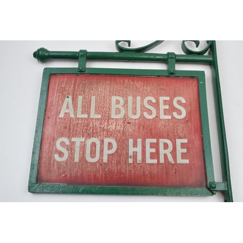 429 - Original 'All Buses Stop Here' enamel sign mounted in metal frame, 36cm long.