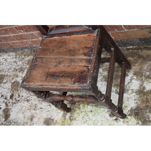 434 - 17th / 18th century oak country hall chair, 100cm tall.