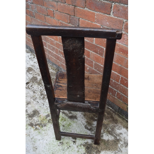 434 - 17th / 18th century oak country hall chair, 100cm tall.