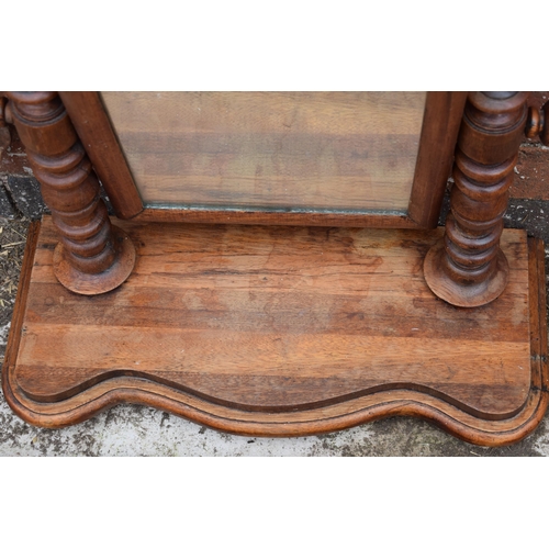 436 - Early 20th century swinging loo mirror together with a butlers tray, 70cm wide (2).